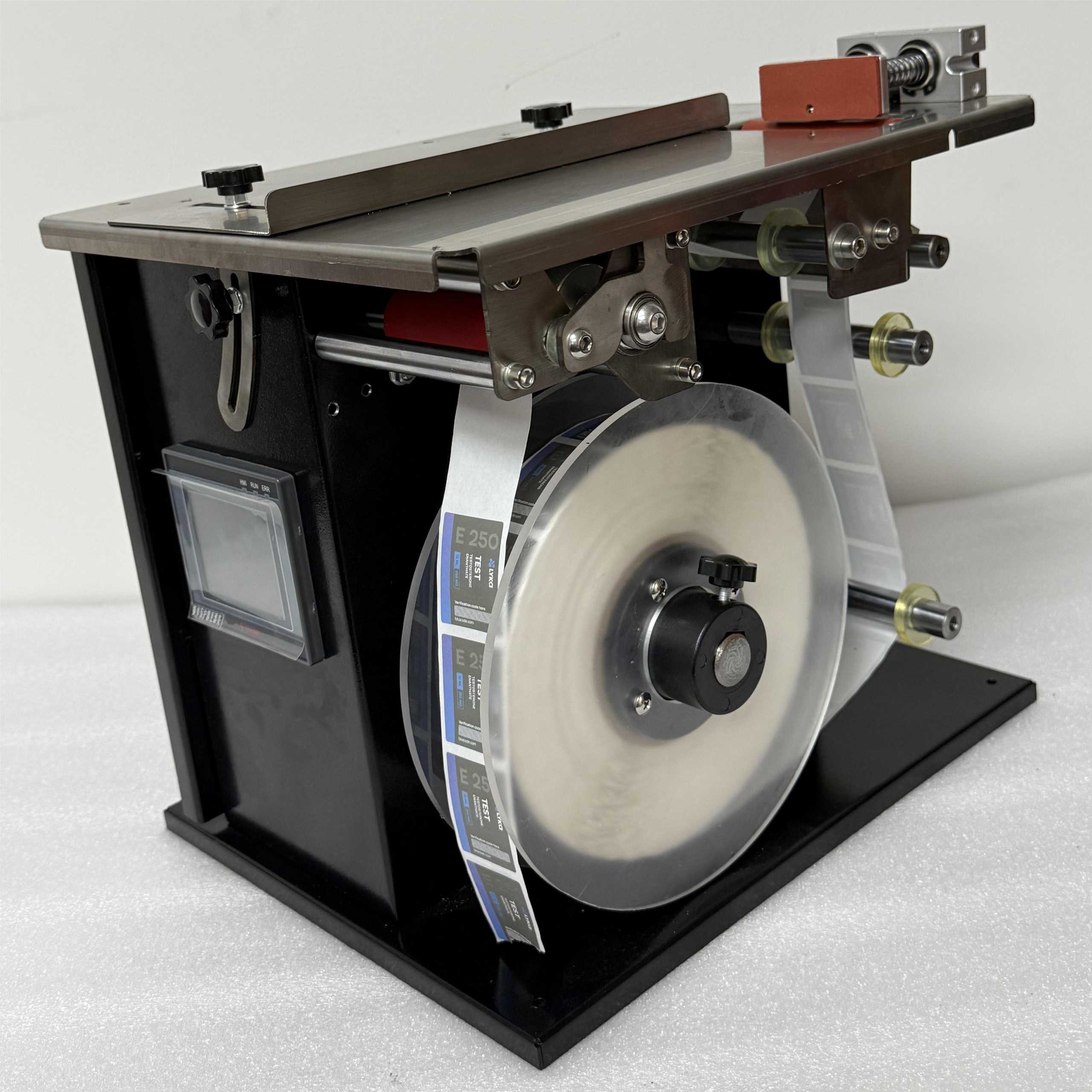 반자동 라벨링 기계